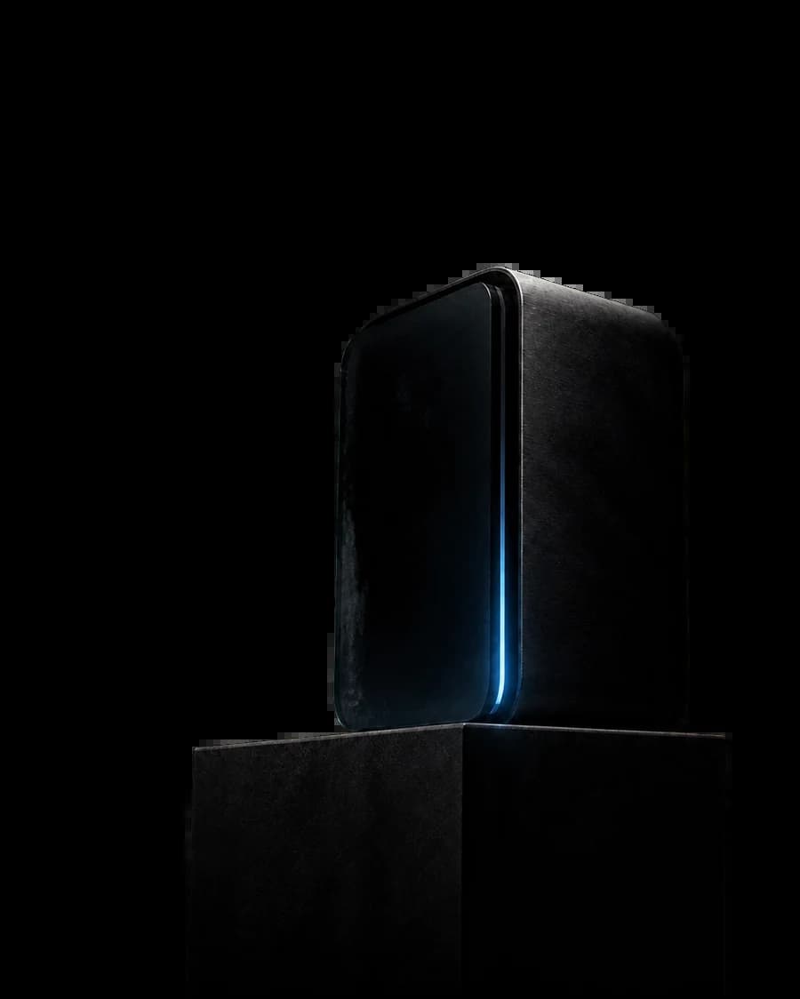 A dark glass monolith lit by a narrow blue seam